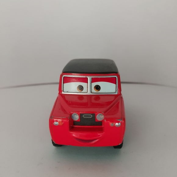 Disney Pixar Cars 2 - Maurice Wheelks Diecast Metal 1:55 Scale Land Rover - Picture 2 of 7
